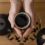 top-view-woman-s-hands-with-teacup-kettle